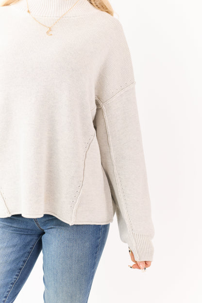 Cloud Grey Mock Neck Exposed Seam Knit Sweater