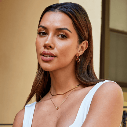 Lira Twisted Heart Hoop Earrings