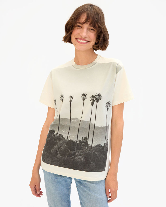 Kathie wears the Cream Thierry Palm Original Tee