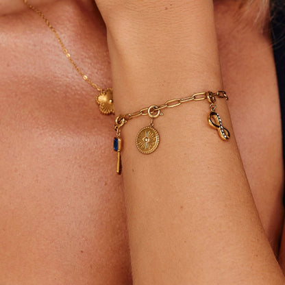 'The Truth' Gold Eye Coin Charm